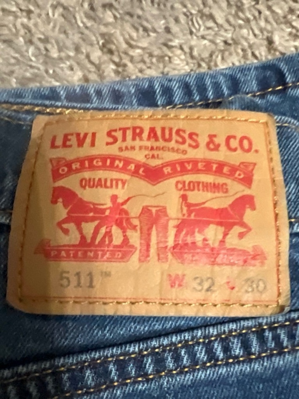 Levi's Slim Jeans in Blue with Tan Patch
